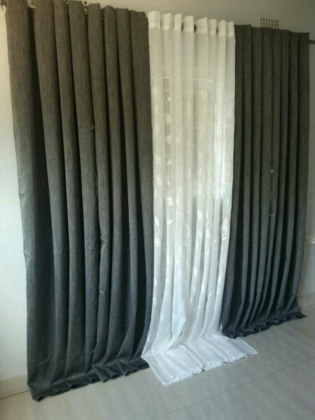 2 drops of curtains white and dark blue