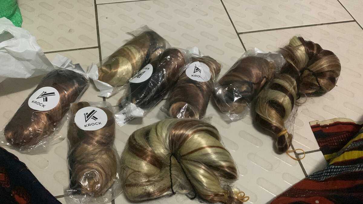 Extensions cheveux bouclés blond