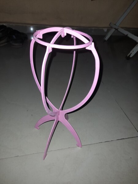 Support de perruque rose
