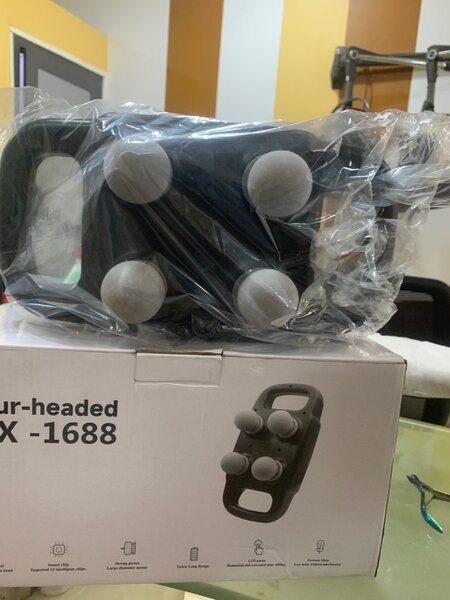 Four headed  massaging gun