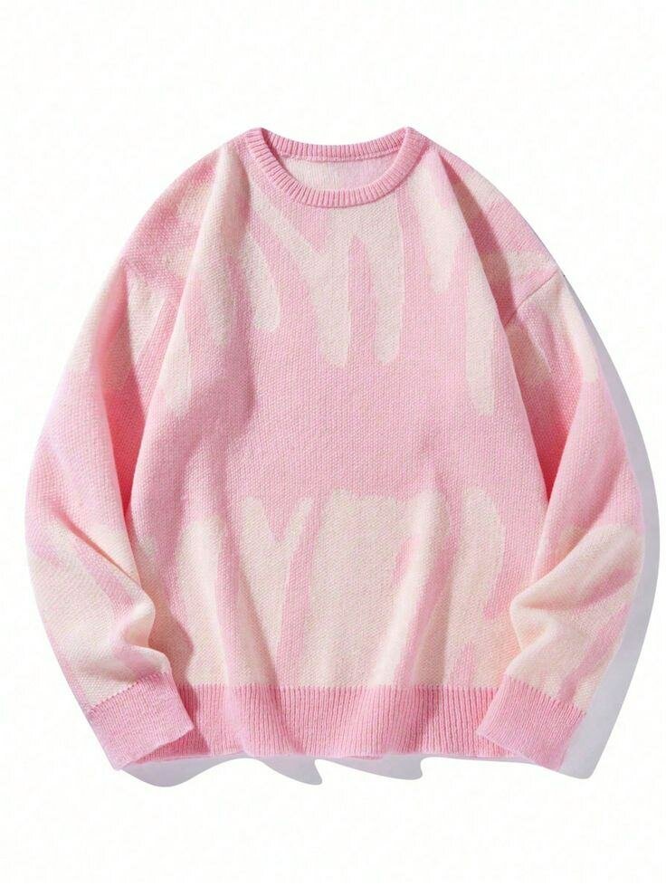 Pull doux rose motifs