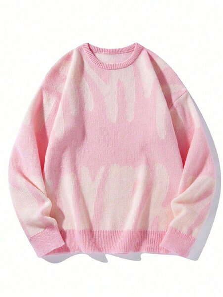 Pull doux rose motifs