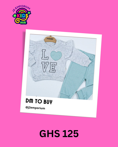 Lovely top with blue pants