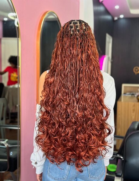 Tissage cheveux roux ondulés