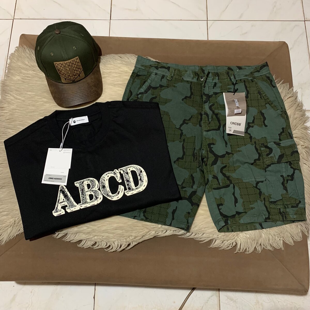 Tshirt, packer shorts and cap