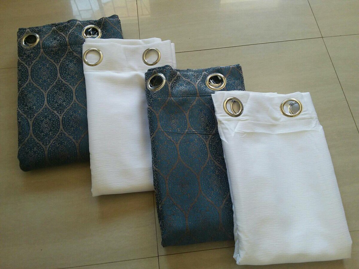 2 drops of curtains dark blue with patterns and white