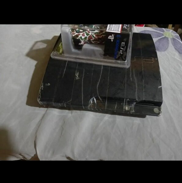 Console PS3 avec Manette DualShock 3