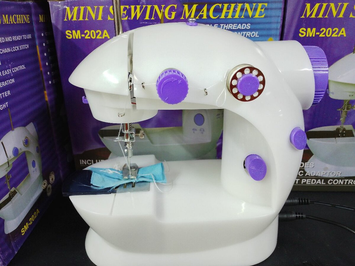 Machine à coudre compacte SM-202A