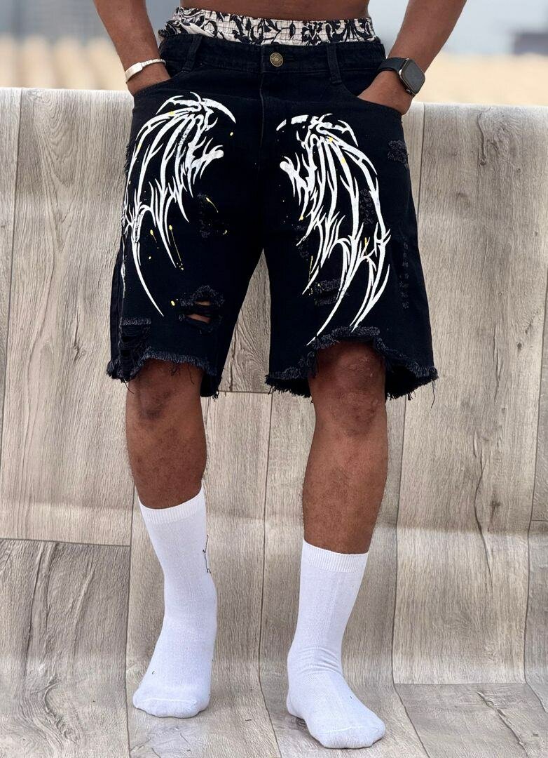 Shorts en denim avec motifs style urbain