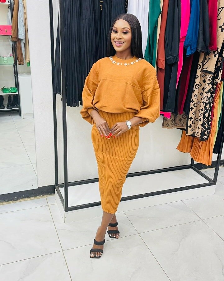 orange knitted suit skirt and jacket