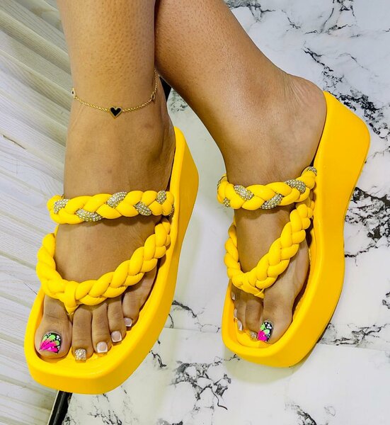 Sandales plates tressées orange