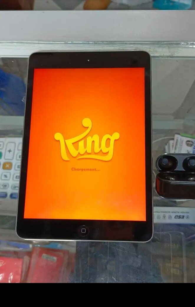 iPad Mini avec écouteurs sans fil