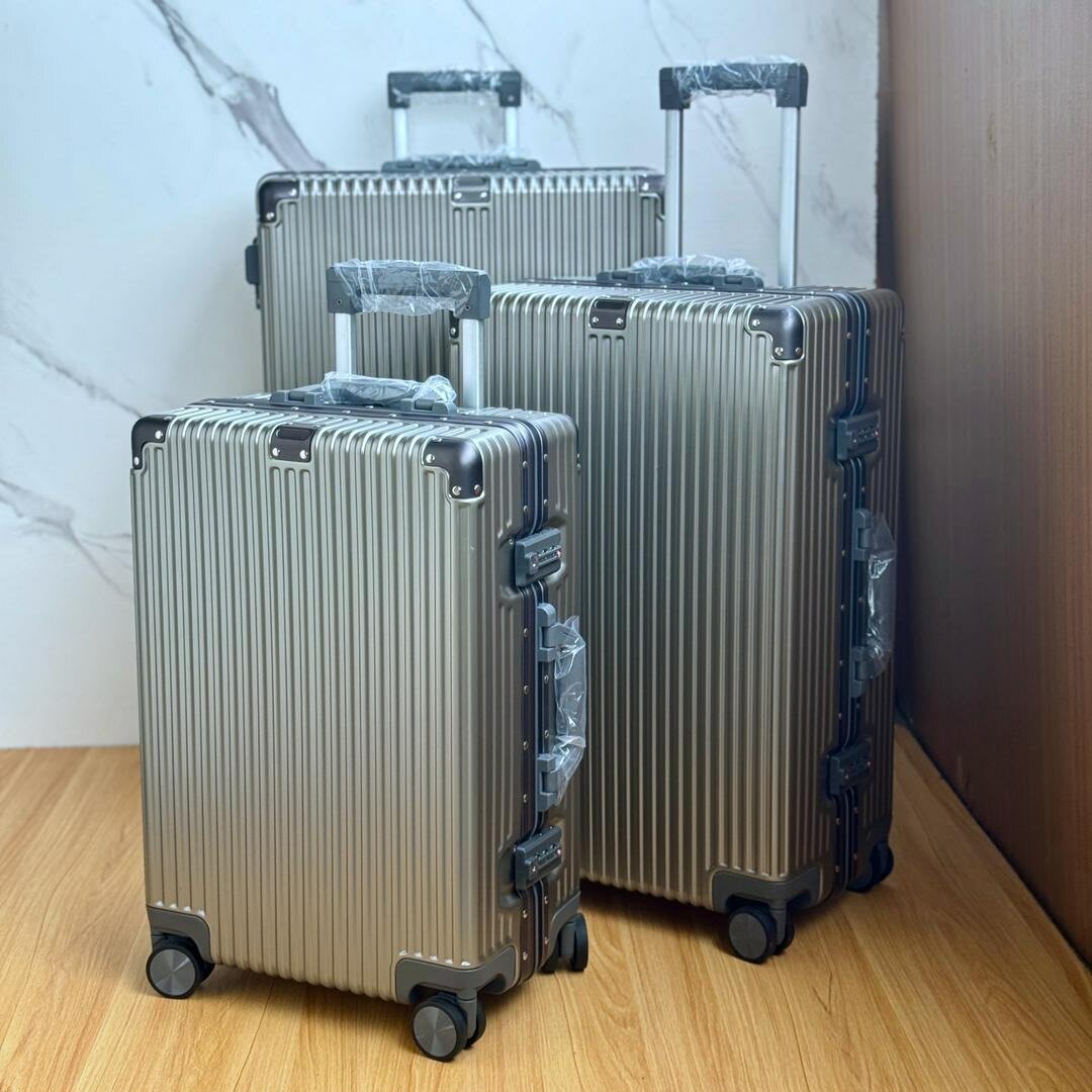 LUXURY STAINLESS SUITCASE  AND TRAVELING BAGS