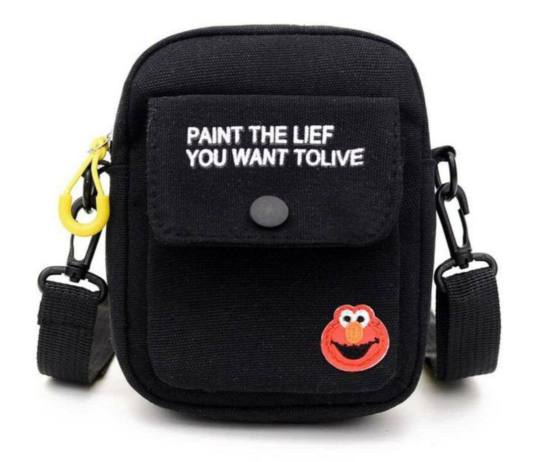 Sac bandoulière en 4 couleur vert ,jaune, noir , blanc