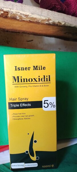 Minoxidile and hair oil