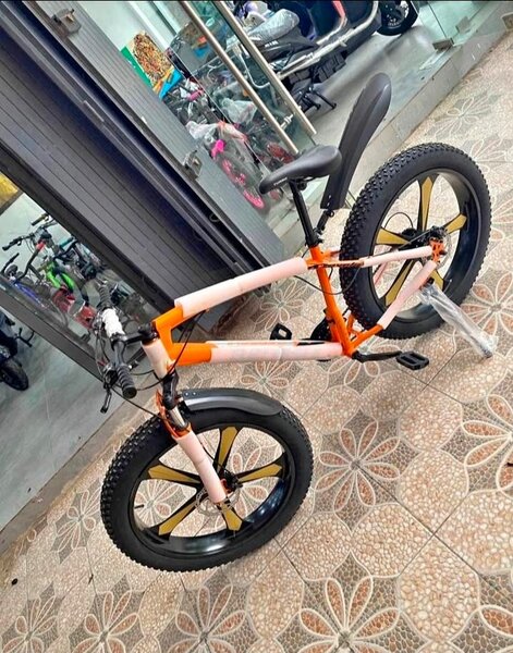 Vélo enfant BMX rose et orange
