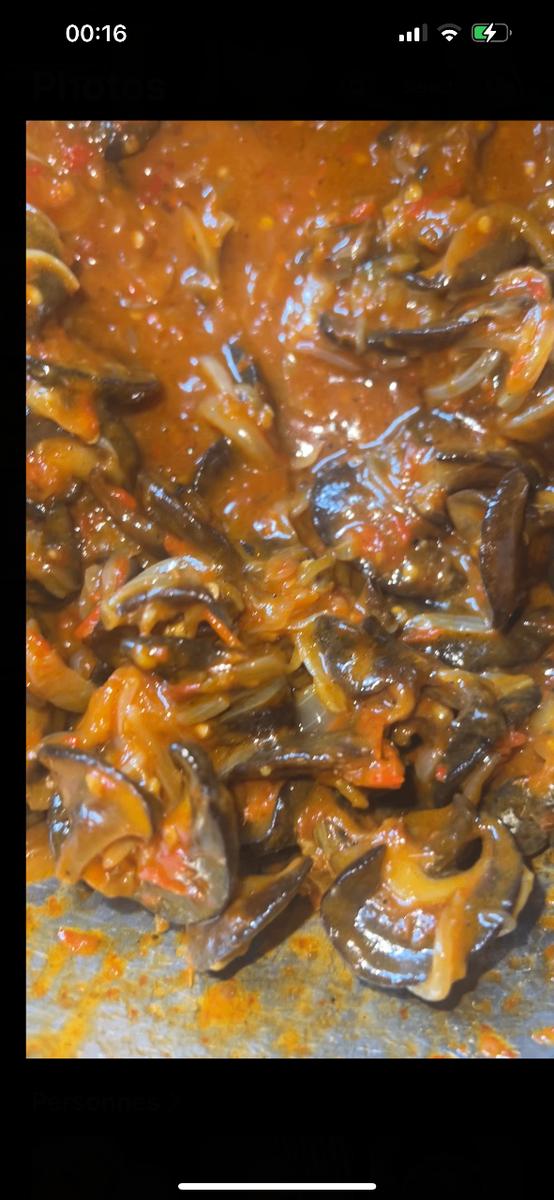 Escargots épicés en sauce