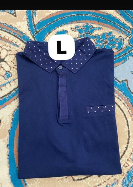 Polo homme bleu à motifs