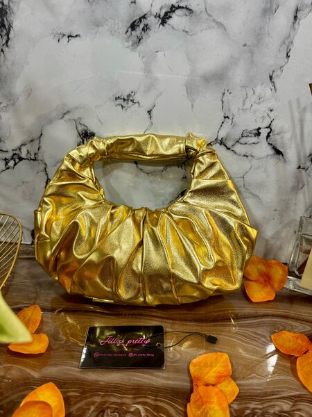 Metallic gold purse