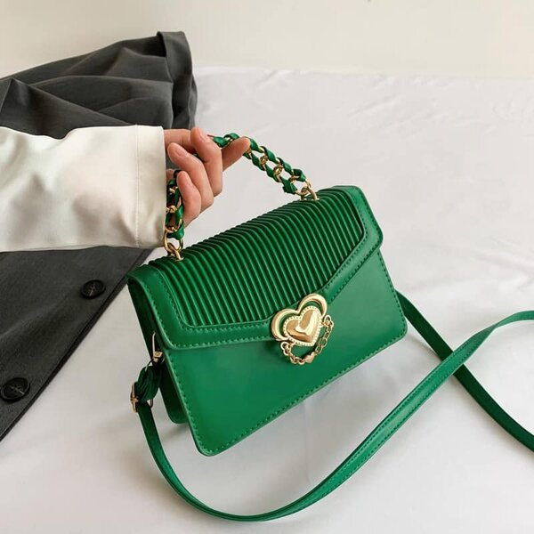 High-quality, stylish women's bag decorated with a heart