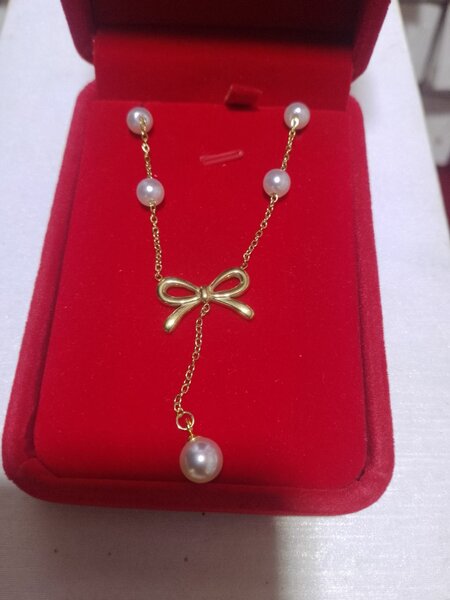 Elegant Pearl Bow Necklace