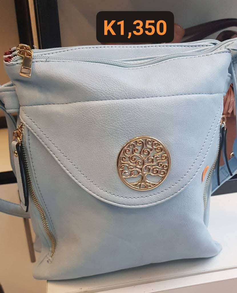 blue leather bag with buckle