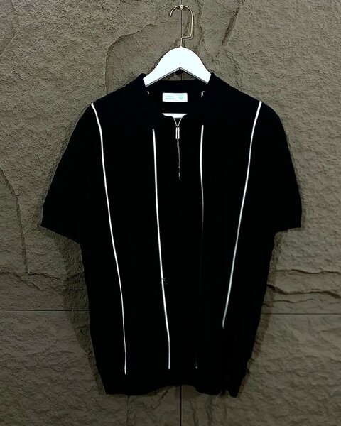 Polo à col zippé chic