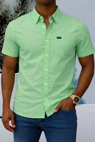 Chemise vert clair poche devant