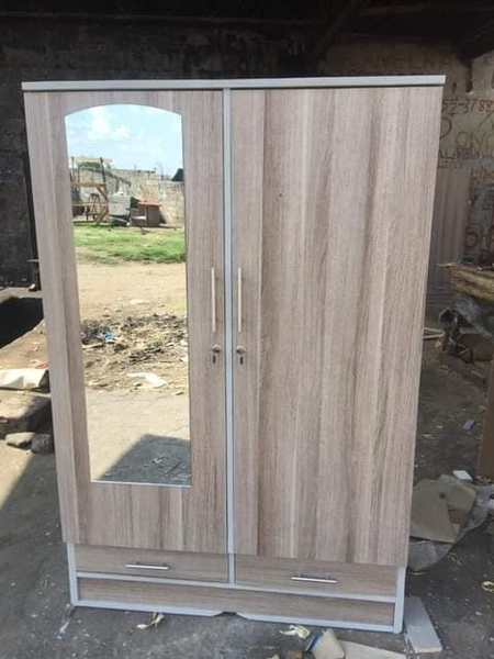 light brown two-line wardrobe with mirror