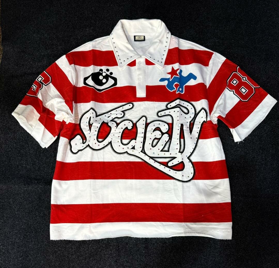 Polo rayé graphique