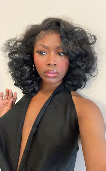 Extensions cheveux bouclés