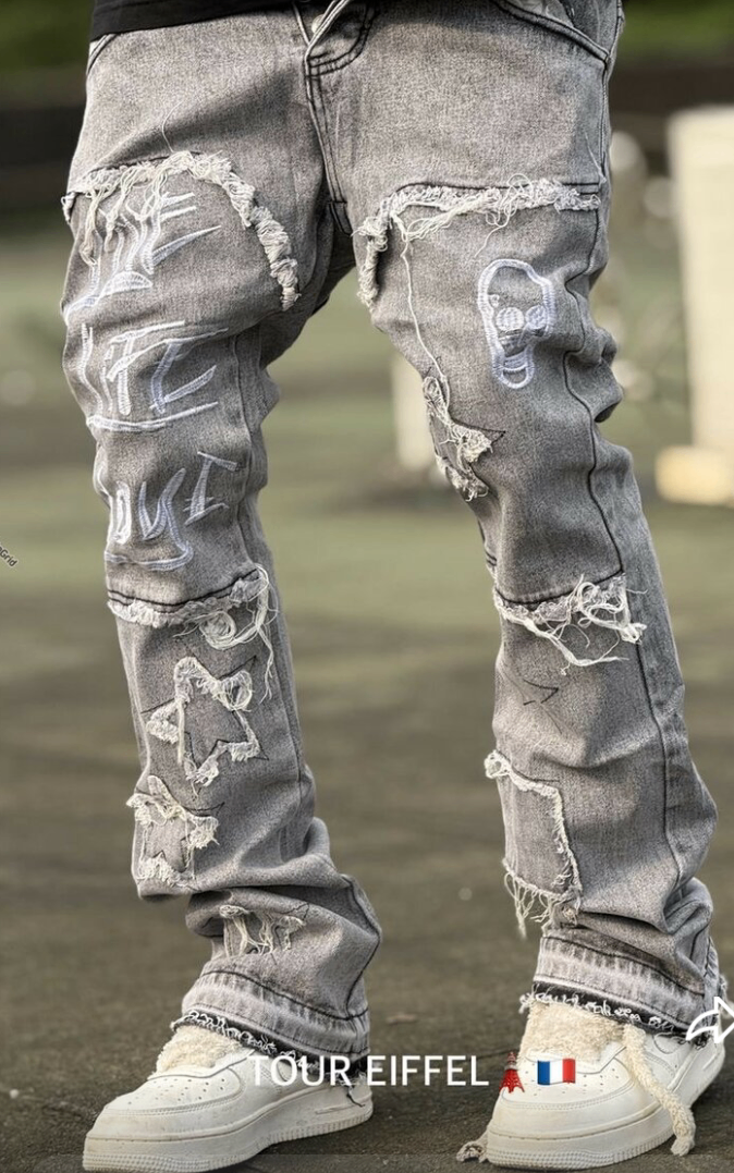 Jeans délavés à motifs