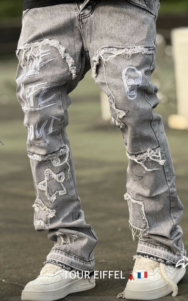 Jeans délavés à motifs