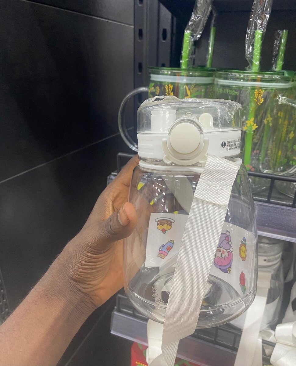 Bouteille en verre avec sangle