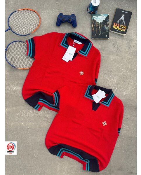 Polo rouge à rayures sportives