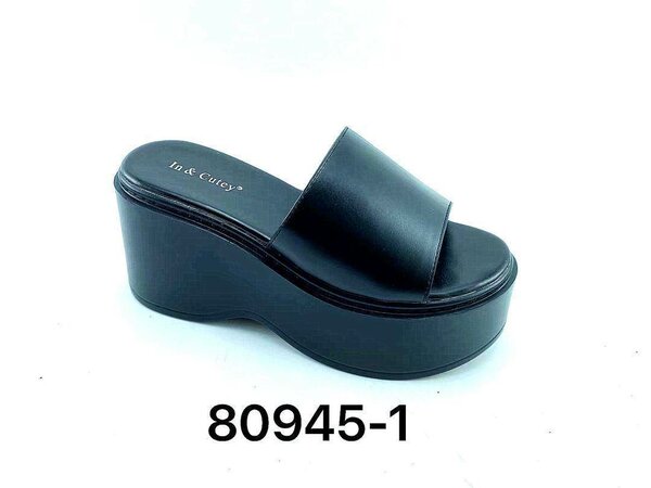 Mules compensées noires élégantes