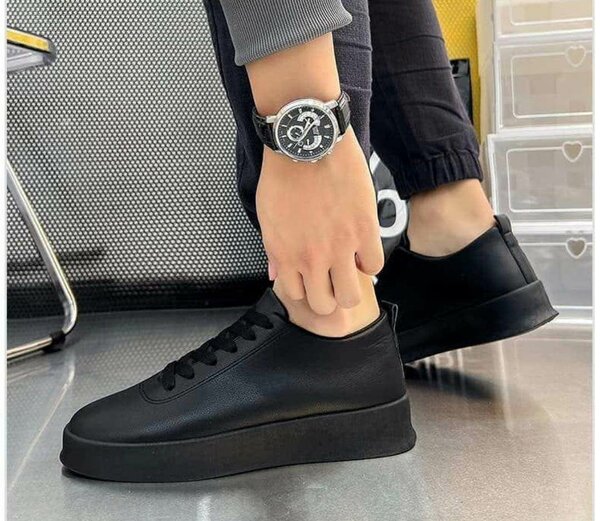 Sneakers en cuir noir