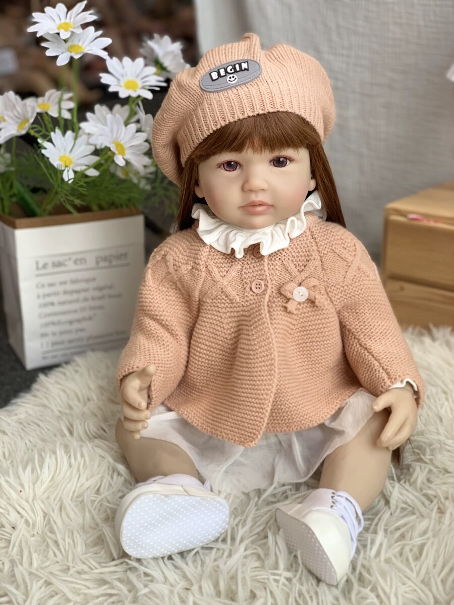 Poupée réaliste en tricot