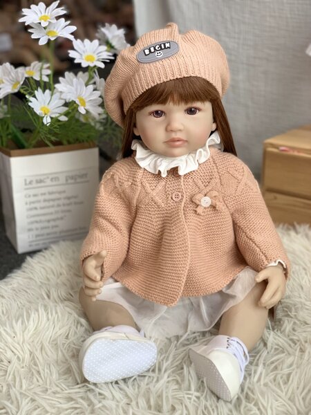 Poupée réaliste en tricot