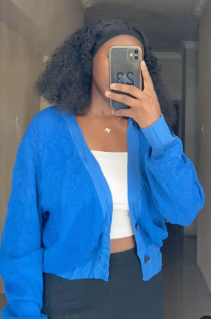 Short knitted Sweater with buttons in blue size: M