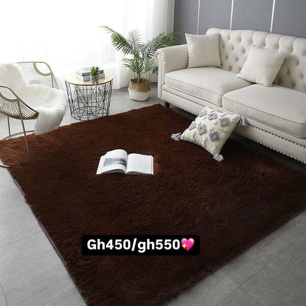 Beautiful and cozy patterned carpet dark brown