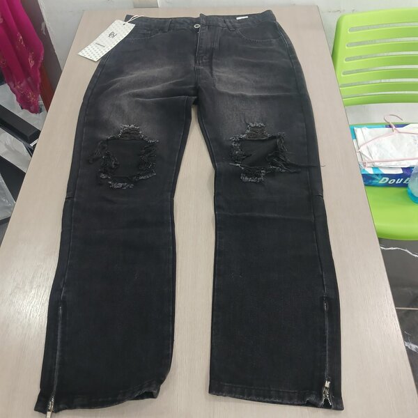 Jeans déchirés noirs