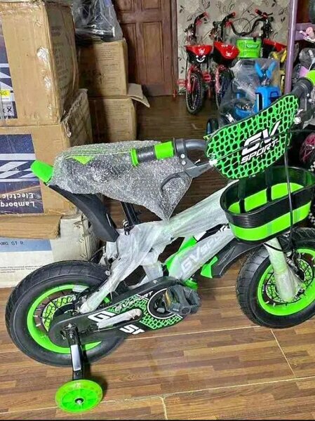 Vélo enfant vert neuf