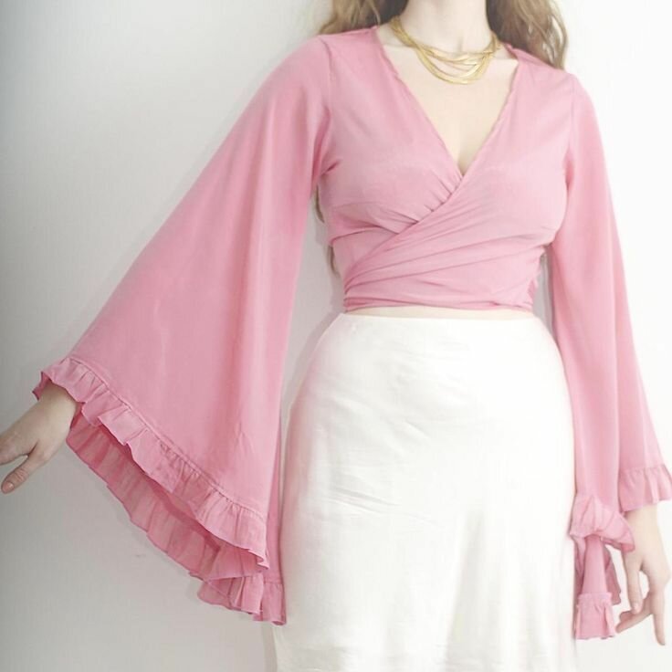 Hauts féminins élégants pour femmes