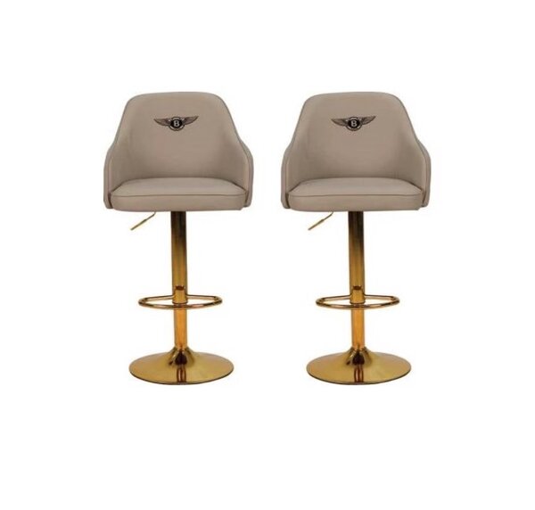 Tabouret de bar luxe en cuir beige et pieds dorés