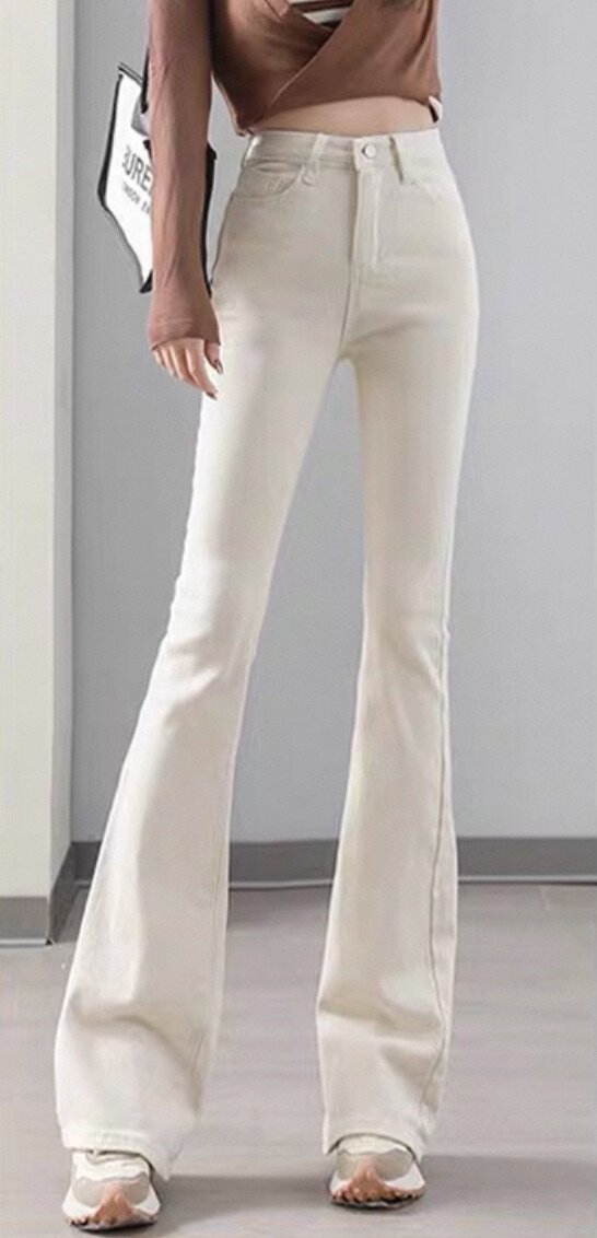 Джинсы клеш