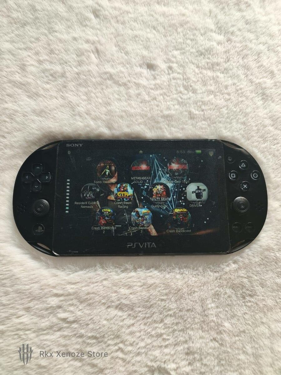 Sony PS Vita noir + 60 jeux