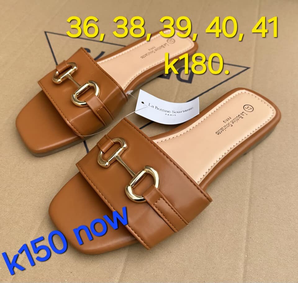 Brown patent leather flip-slops with gold hardware