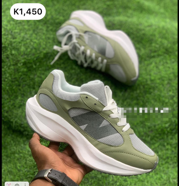 beige and white sneakers