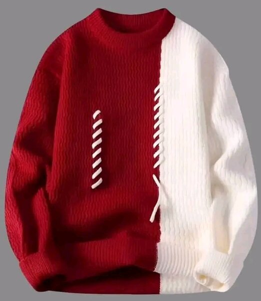 Pull bicolore à motif torsadé